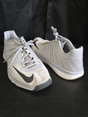 Nike Zoom Light Gray Athletic Shoes with Black Swoosh and Neon Yellow Accents